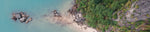 Aerial view of the coast, depicting the scents of the ocean breeze and salty air.